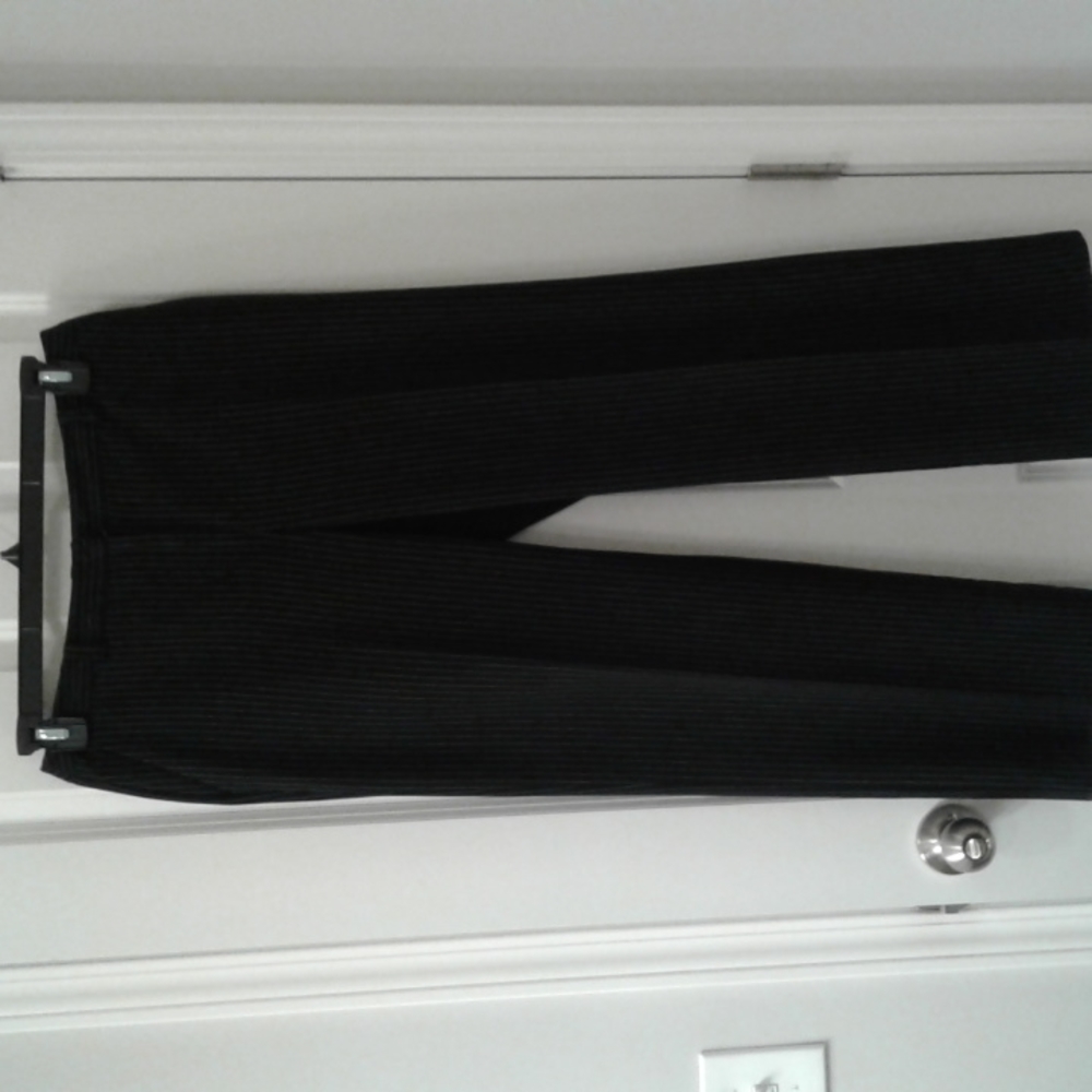 Black pants with very fine white stripe.